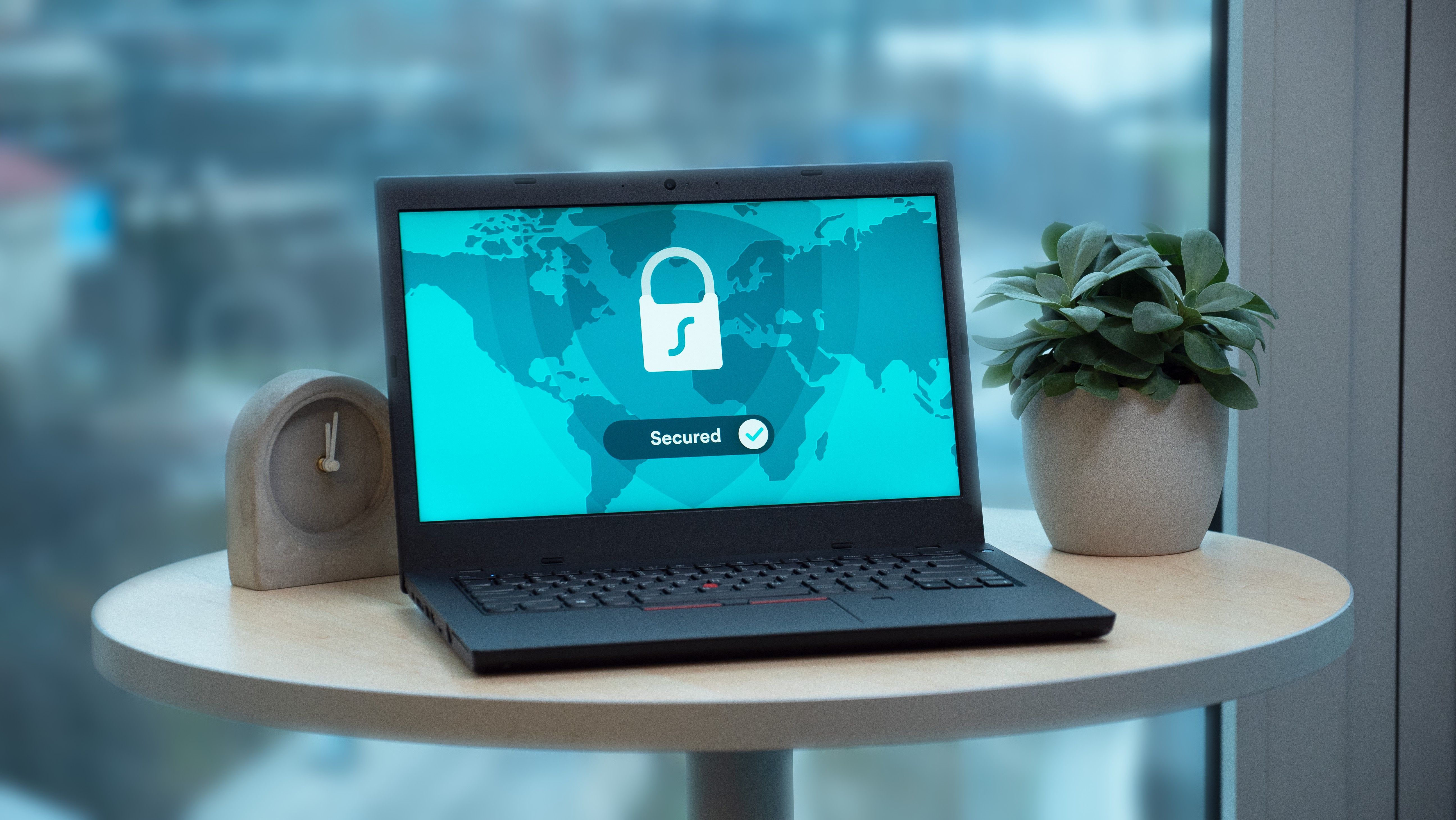 A computer shows a padlock on its screen and says that it is secured