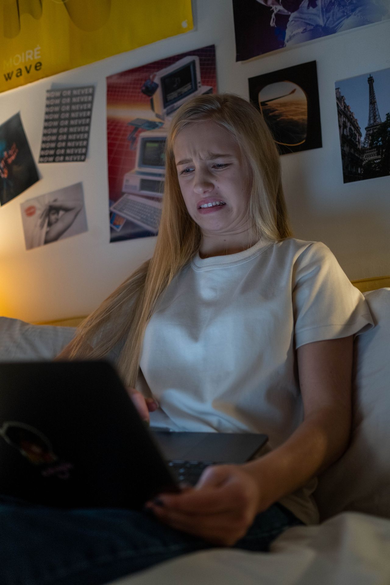 A woman using a laptop to meet someone new online